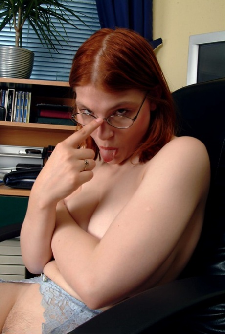 Amateur Redheaded Secretary Kelly M Flaunts Her Big Boobs And Toys Herself