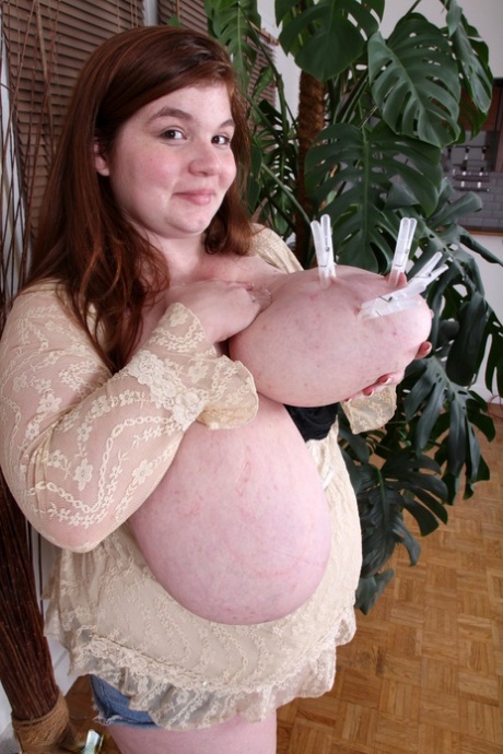 In her role as a fat amateur brunette, Lexxxi Luxe plucks out gigantic melons and uses them for pleasure.