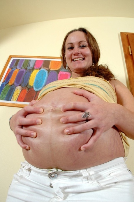Charming Preggo Julie Revealing Her Big Belly And Bald Cock-craving Pussy