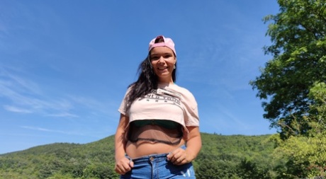 Beautiful Czech teen Sofia Lee exposes her big natural tits outdoors