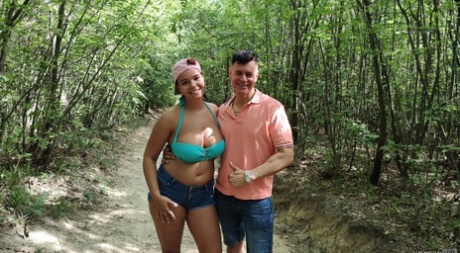 Stylish Sofia Lee, from the Czech Republic, flaunts her enormous natural tits outside her home.