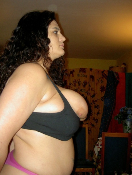 Tristal, a stacked amateur, was photographed in Paris at night showing her large saggy tits.