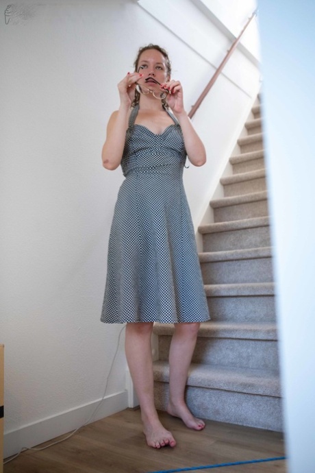 Little girls: Lotte "L" who is dressed down by her parents, dresses and talking before a meal.