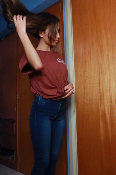 Attractive teen Camila Luna shows her amazing boobs & booty while smoking