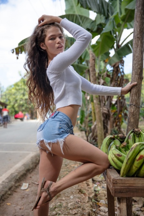 Lovely teen in denim shorts Irene Rouse stretches her long legs wide in public - PornHugo.net