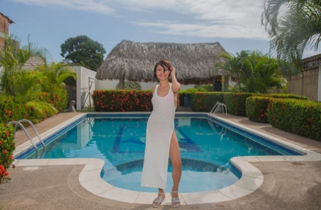 Venezuelan Model Natali Leon Posing In Her Provocative Dress Poolside