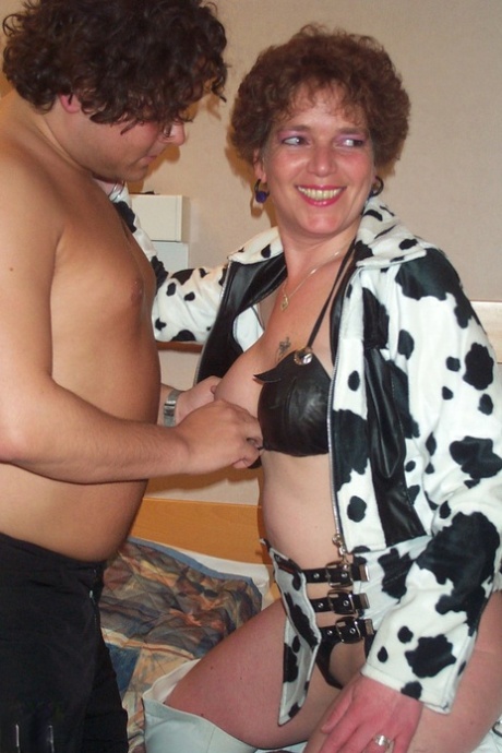 Saskia, the brunette granny, exposes her large tits, performs oral sex and gets rammed good-speed.
