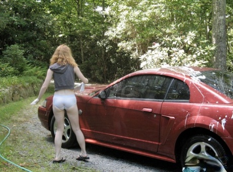 Amateur teen Nicki Blue unveils her tiny tits & hot muff while washing the car