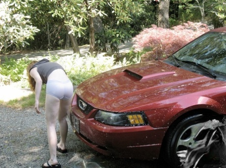 Amateur teen Nicki Blue unveils her tiny tits & hot muff while washing the car