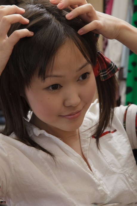 Little Asian Teen Ksu Puts Her Schoolgirl Outfit On And Masturbates