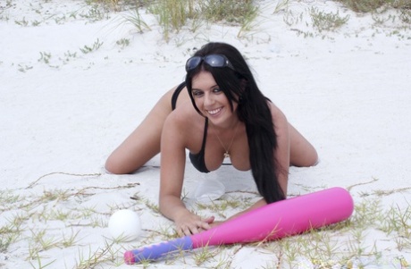 After having sex with Kodi Gamble, the brunette lover takes to the beach for a photo before going into hard sex at their home.