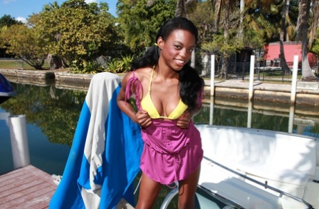 Tiffany Tailor, the slim ebony, displays her traits and gets dazed outside.