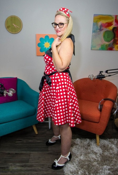 In her sexy Minnie costume and heels, Dee Siren, the beautiful mature wife, is captured in this photo.