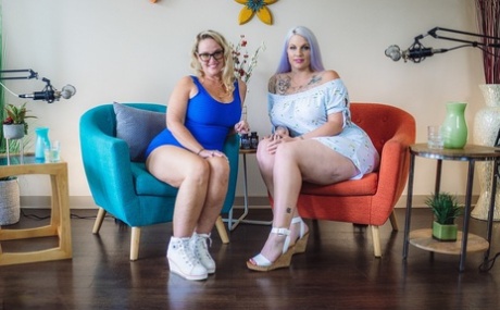 The debonair attire of Dee Siren and LuckyB Dallas showcases their mature wives in sexy costumes.