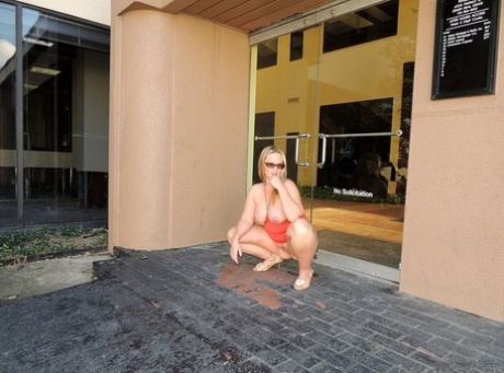 Horny Blonde MILF Dee Siren Shows Her Huge Tits And Poses In Public