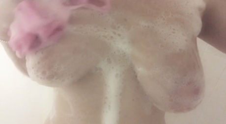 In the shower with her big natural curves and jagged butty, Natasha, an amateur, teases herself.