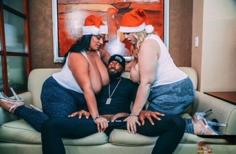 Using festive clothing, the black criminal performs sexual acts on him while giving him a blowjob or handcuffing.