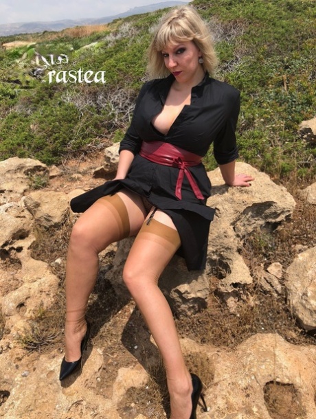 Seductive MILF Miss Adrastea Flaunts Her Sexy Legs In Her Stockings Outside