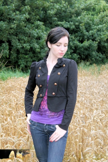 Gorgeous Brunette Babe Posing In Her Purple Shirt & Jeans In A Wheat Field