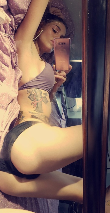 Petite Babe Kakia Lynn Shows Her Beautiful Tattoos Wearing Sexy Lingerie