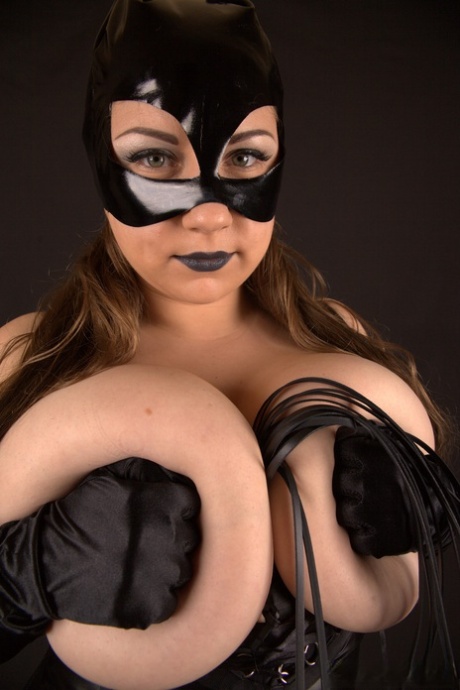 MILF is dressed in a Catwoman mask as catwoman Samanta Lily exposes her great breasts.