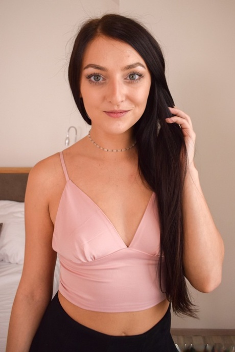Beautiful teen Carlina slips off a satin robe to pose totally nude