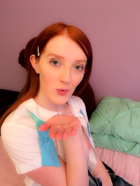 Petite Schoolgirl With Red Hair Krystal Orchid Flaunts Her Muff On A Bed