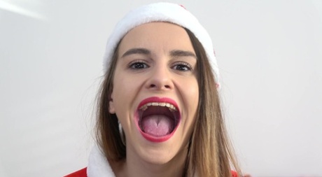 Hottie in a Xmas outfit opens her mouth & gets her teeth checked by a dentist free pics gallery #4