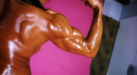 Bodybuilder With Fake Boobs Marina Lopez Flaunts Her Shiny Body In A Solo