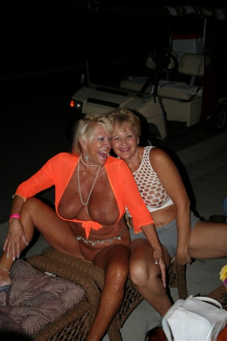 The big tits and tasty clams of Kay, an amateur swinger, are showcased by her friends.