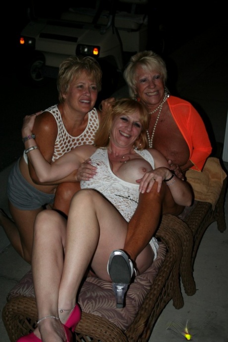 In the open air, Kay and her fellow swingers showcase their big tits and delicious oysters.