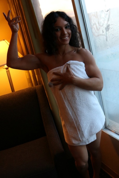 Stunning Bodybuilder Tia Poses In A Bikini & Struts Nude In A Public Toilet