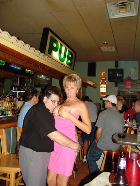 At the bar, promiscuous spouses are all set to display their ample chest muscles in a showy manner.