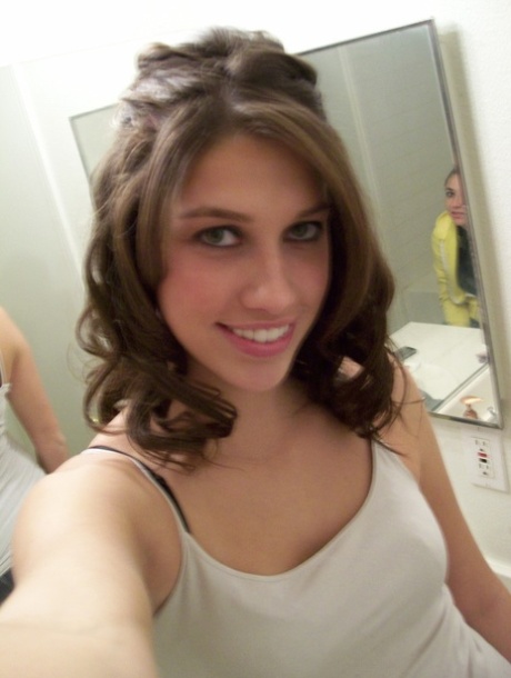 Breathtaking brunette teen Adrianna posing in a solo and taking selfies