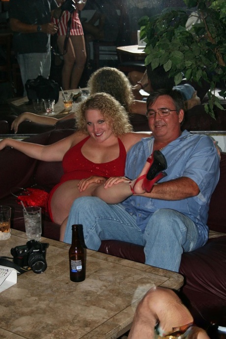 At a gathering, adult amateur swingers played and engaged in French kissing and teasing.