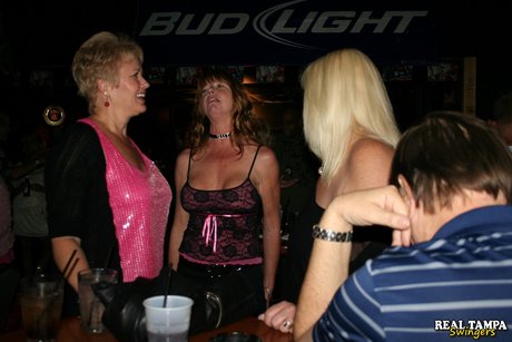 Glittery: Swinging wives in uncharacteristically high spirits show off their big tote genitalia and suck harddicks in public.