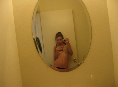 Beautiful amateur teen Dixie takes selfies of her hot body in the mirror