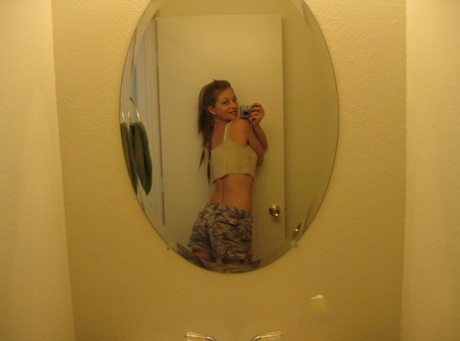 Beautiful amateur teen Dixie takes selfies of her hot body in the mirror