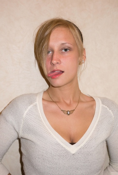 Blonde Girlfriend Alice Wonder Posing In Sexy Bodysuit On The Stairs