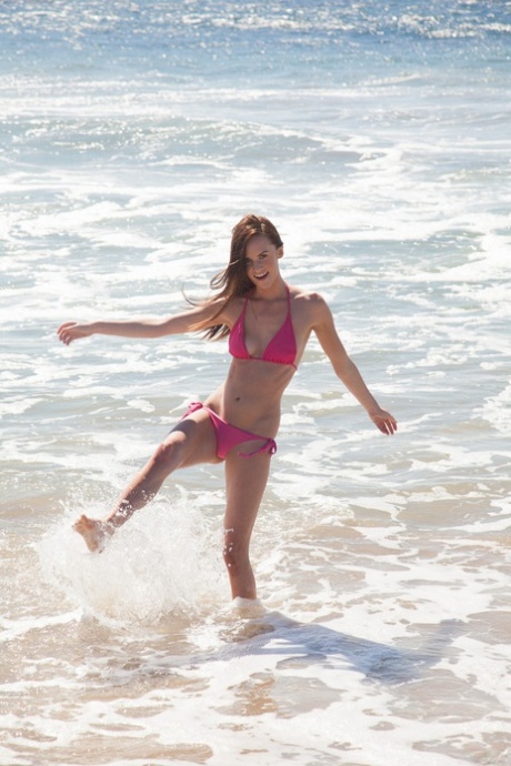 Skinny teen Jayden Taylors showing off her body while walking around the beach