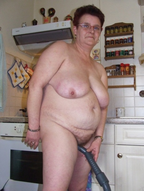 As she sticks a vacuum pipe in her twat, old grandma Ingeborg shows off the fat body.