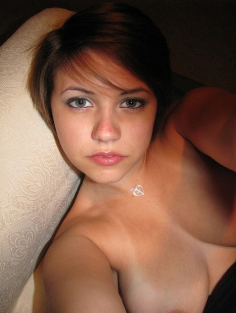 Pretty Amateur Licks Her Nipples While Showing Off Her Big Breasts