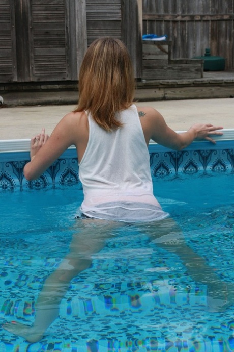 Horny Amateur Teen Wife In A White Shirt Teases In The Swimming Pool