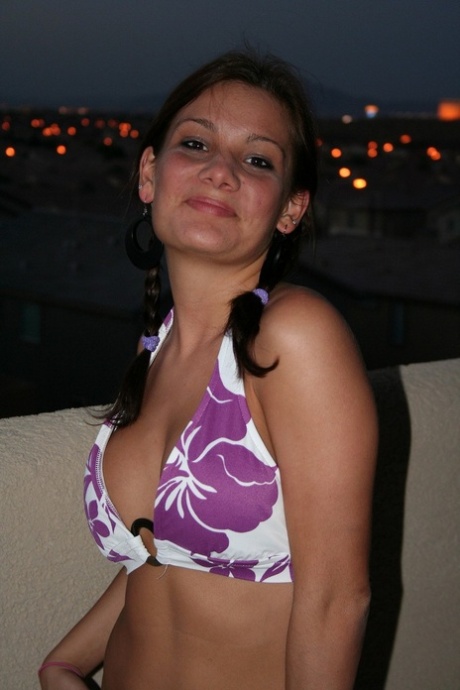 At night time, Katie exposes her large breast and poses in the buff.