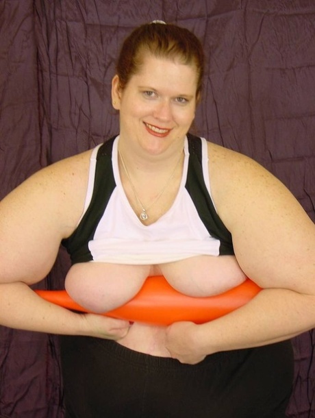 The mischievous Naughty SSBBW doll with her baseball bat to play with her tightly shaved vagina.