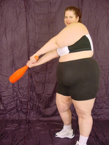 Naughty SSBBW treats her clean-shaven partner to a baseball bat while playing.