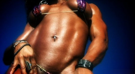 A bikini top sported by Ebony bodybuilder Alexis Ellis makes her look muscular.