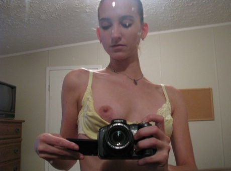 Teenager Becky displays her hot tits and clean-shaved cuntures in closeup selfies.