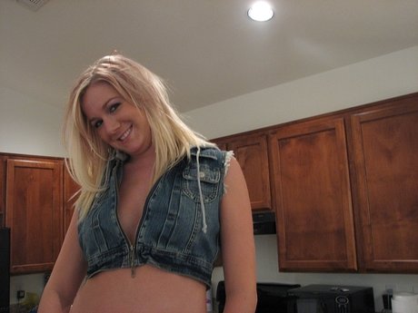 Naughty Teen Austin Unveils Her Natural Tits While Posing In A Solo