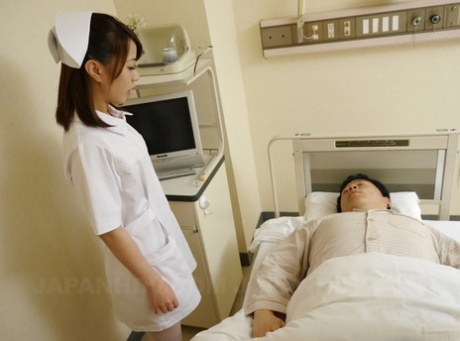 Sweet Asian nurse Reina Wamatsu gives a great blowjob to her patient.